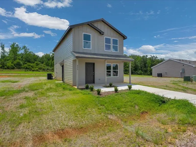 Front exterior of a new home in Redland Estates, Lufkin, TX, highlighting curb appeal (Image 2). Front exterior of a new home in Redland Estates, Lufkin, TX, highlighting curb appeal (Image 2).