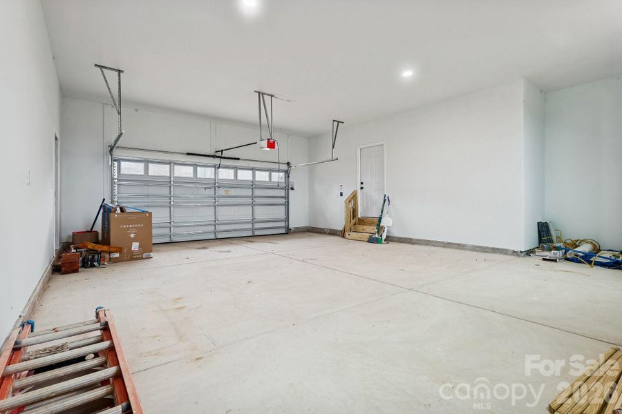 Super deep oversized 2-car garage with high ceilings is the perfect garage for anyone