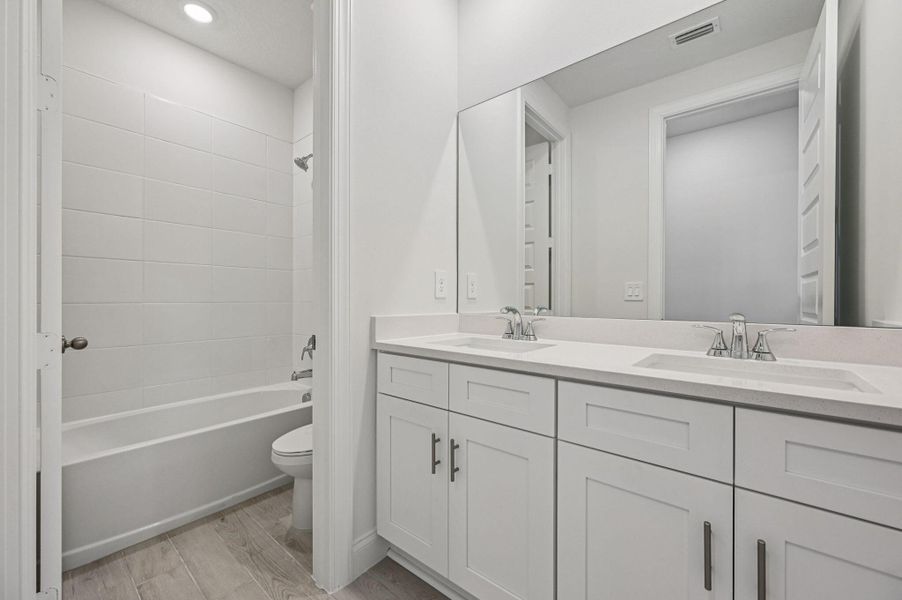Furnished interior view inside a new home in Brystol at Wylder - Reserve Series, Port St. Lucie (Image 14).