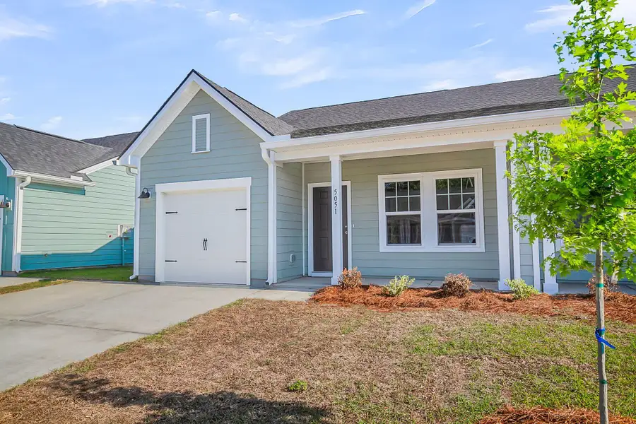 Exterior details and patio area of a home in , Ravenel (Image 3). Exterior details and patio area of a home in , Ravenel (Image 3).