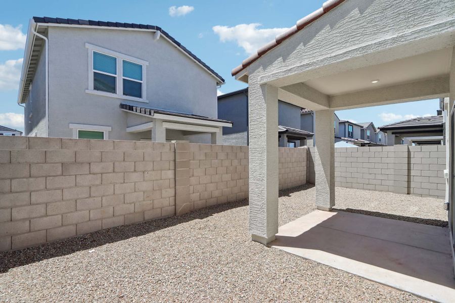 A house with a stone wall.