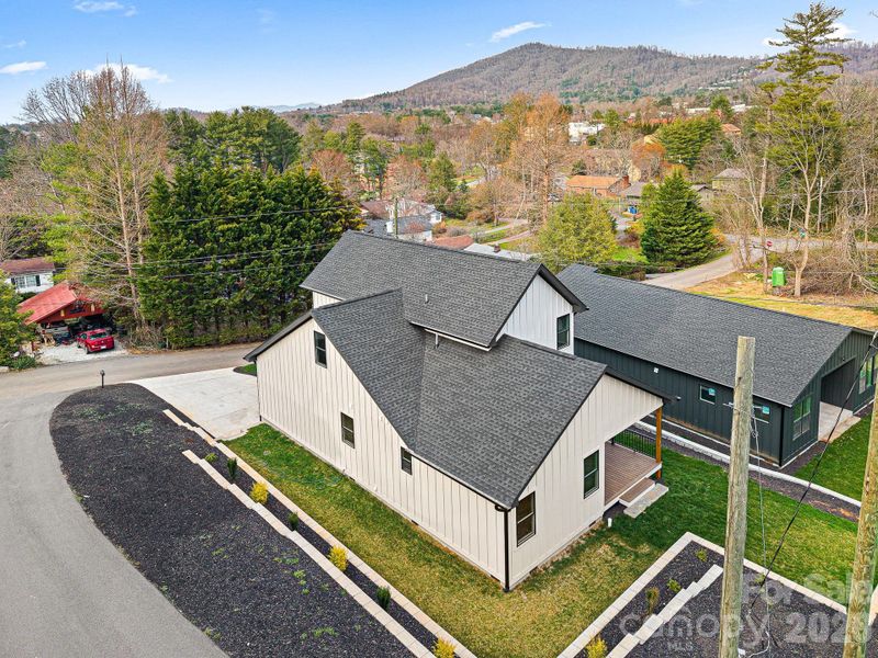 Front exterior of a new home in , Asheville, NC, highlighting curb appeal (Image 24). Front exterior of a new home in , Asheville, NC, highlighting curb appeal (Image 24).