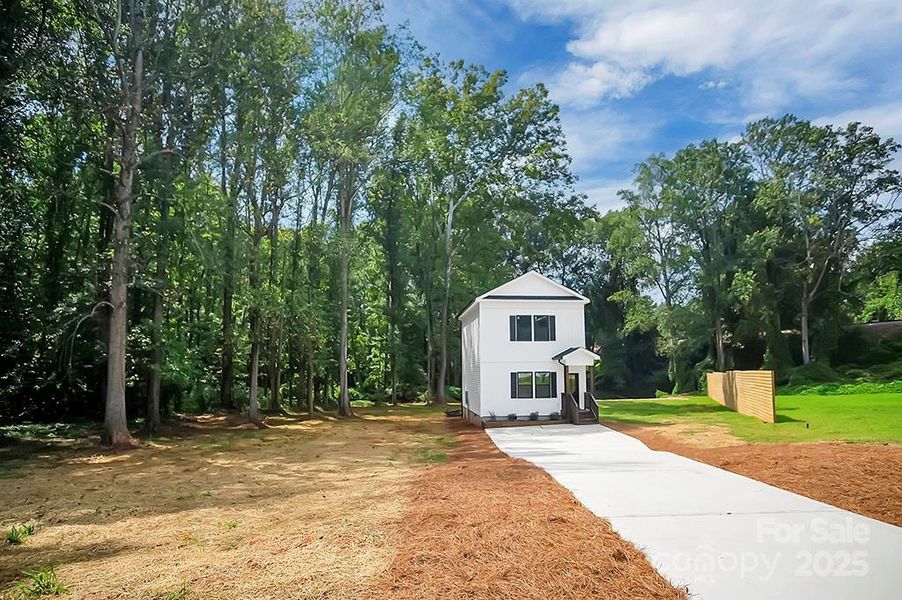 Front exterior of a new home in , Shelby, NC, highlighting curb appeal (Image 20).