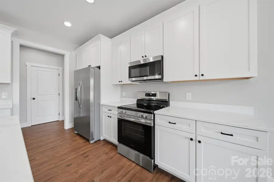 Furnished interior view inside a new home in , Lenoir (Image 11).
