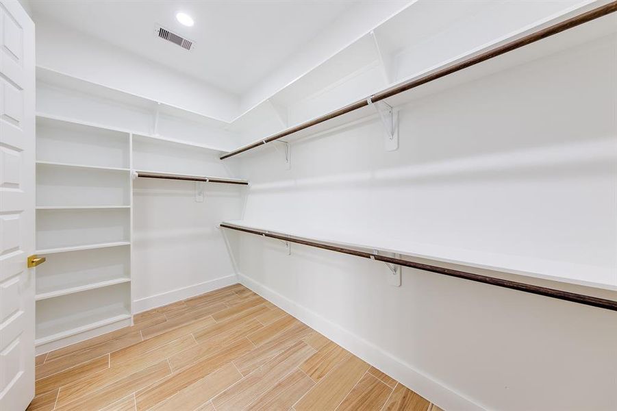 Welcome to your dream walk-in closet! This spacious retreat offers plenty of room to organize your wardrobe just the way you like it. It’s not just a closet; it’s your personal haven for style and self-expression!