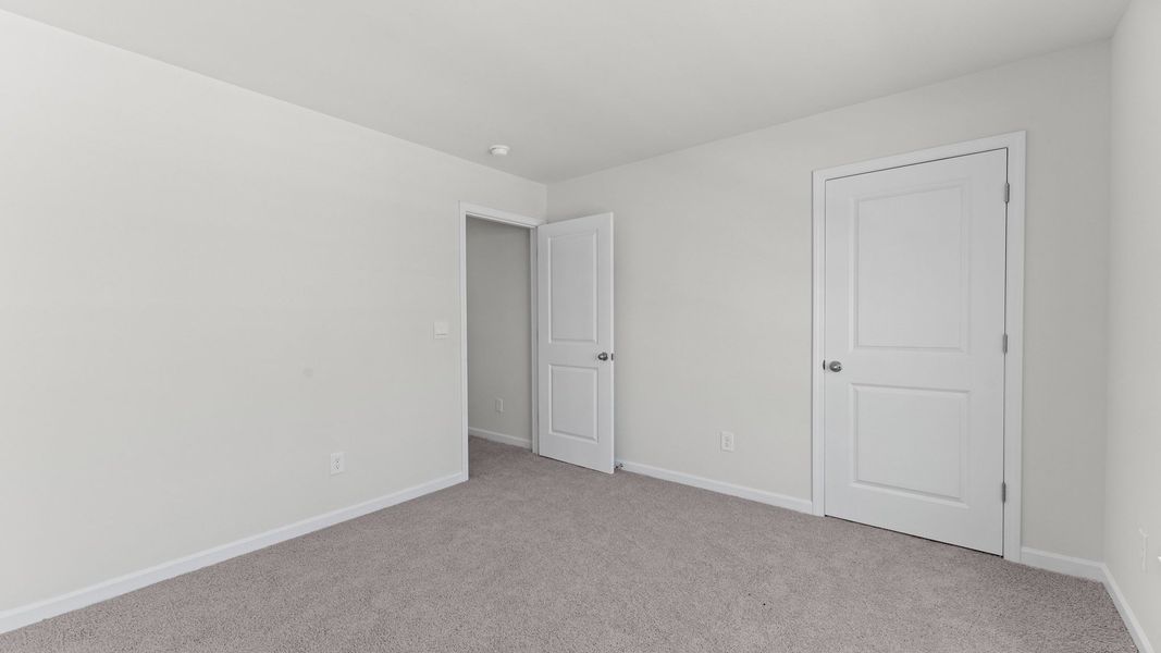Spacious, unfurnished interior of a new home in Beaver Dam Crossing, Bailey (Image 28). Spacious, unfurnished interior of a new home in Beaver Dam Crossing, Bailey (Image 28).