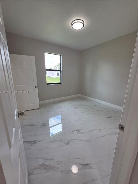 Spacious, unfurnished interior of a new home in , Lehigh Acres (Image 16).
