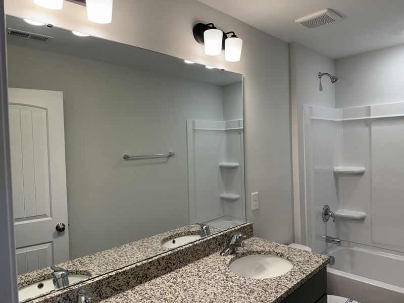 Furnished interior view inside a new home in Enclave at Traditions Townhomes, Wake Forest (Image 8). Furnished interior view inside a new home in Enclave at Traditions Townhomes, Wake Forest (Image 8).