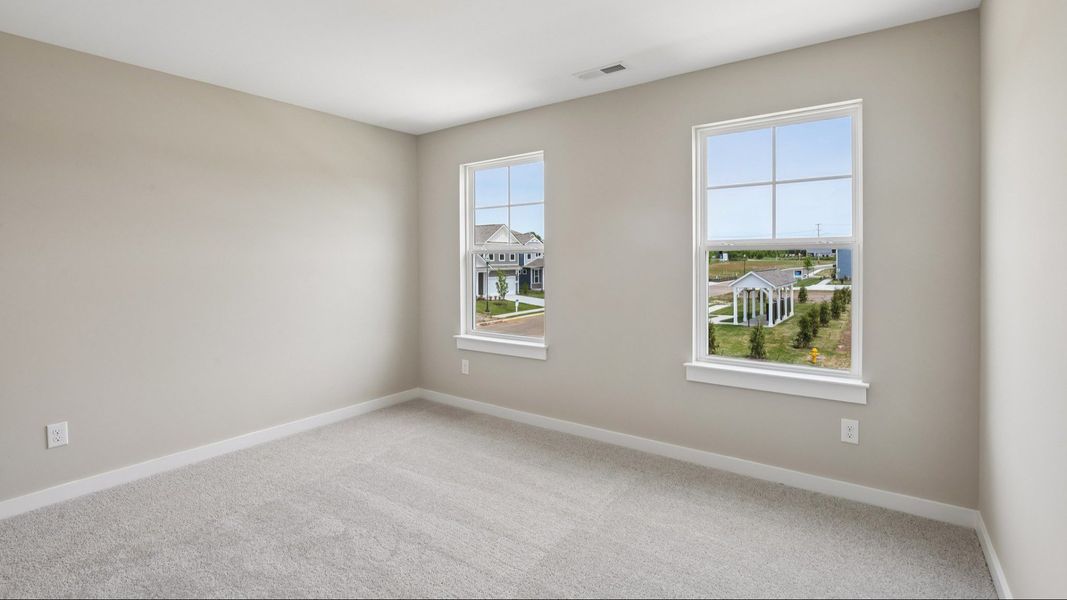 Secondary Bedroom with two windows