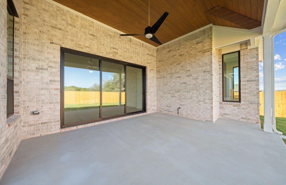 Exterior details and patio area of a home in 6 Creeks, Kyle (Image 23).