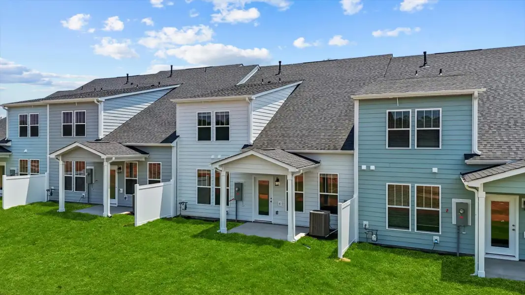 Exterior details and patio area of a home in Village at Midway, Anderson (Image 3).