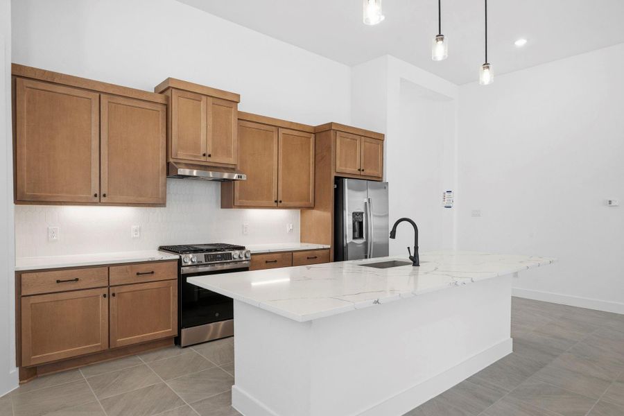 Furnished interior view inside a new home in The Trails, New Caney (Image 7).
