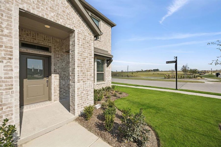 Exterior details and patio area of a home in Elevon, Lavon (Image 28).
