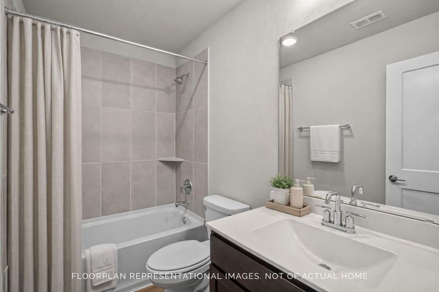 Furnished interior view inside a new home in Sorella, Tomball (Image 10).