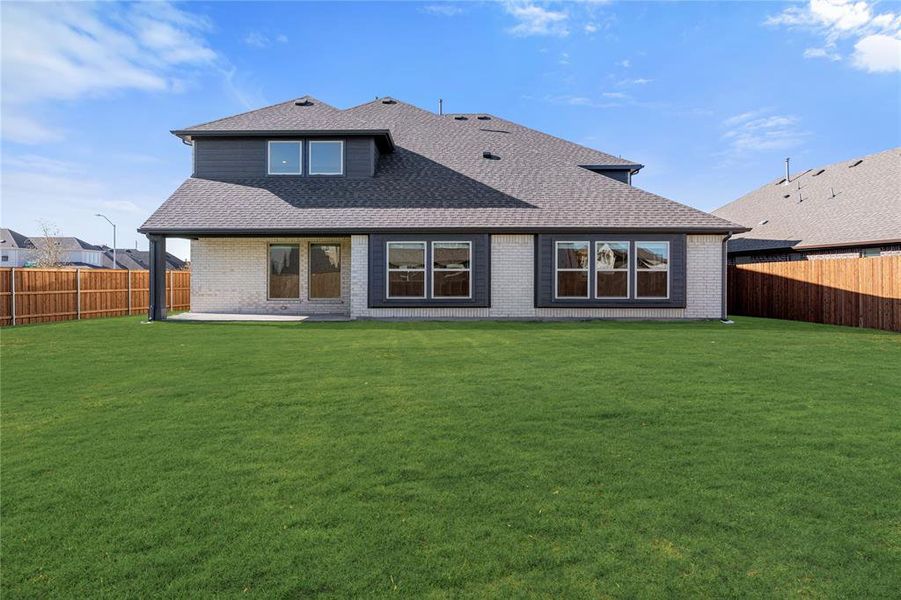 Exterior details and patio area of a home in Wildflower Ranch 60-65, Fort Worth (Image 4). Exterior details and patio area of a home in Wildflower Ranch 60-65, Fort Worth (Image 4).