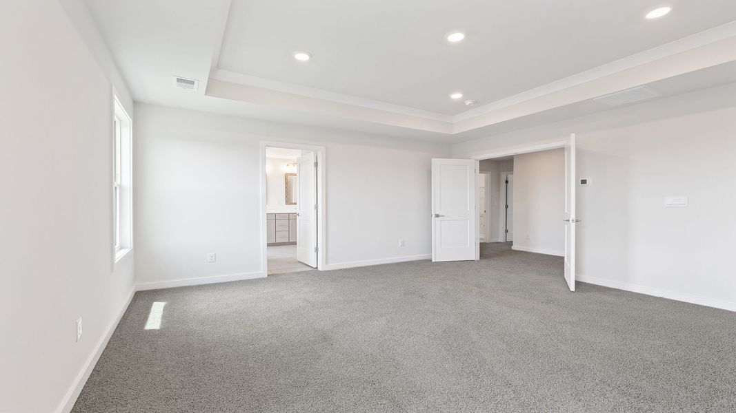 Spacious, unfurnished interior of a new home in Adams Glen, Greenville (Image 24).