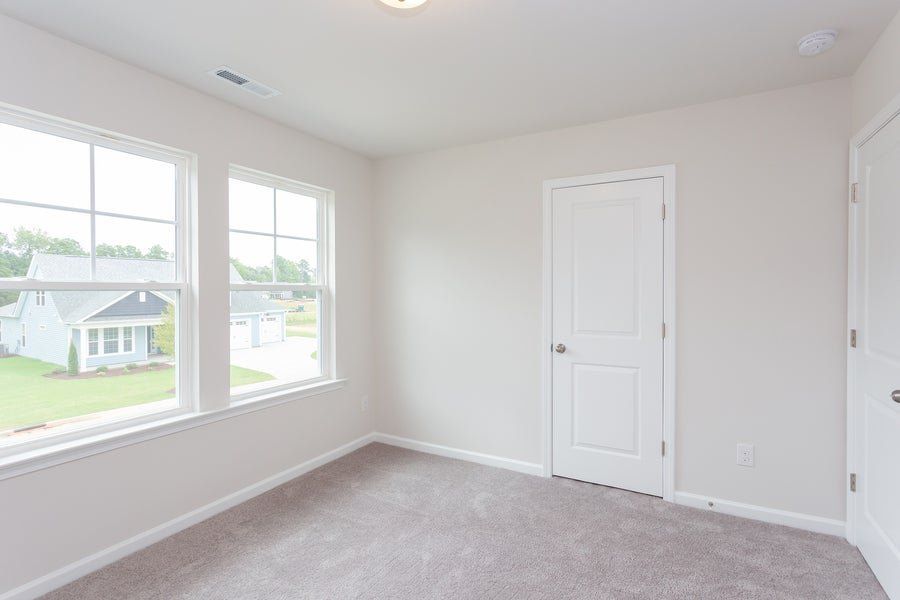 Representative unfurnished interior of a home built from the The Sycamore by Chesapeake Homes in Traditions at Carolina Forest, Myrtle Beach (Image 22).