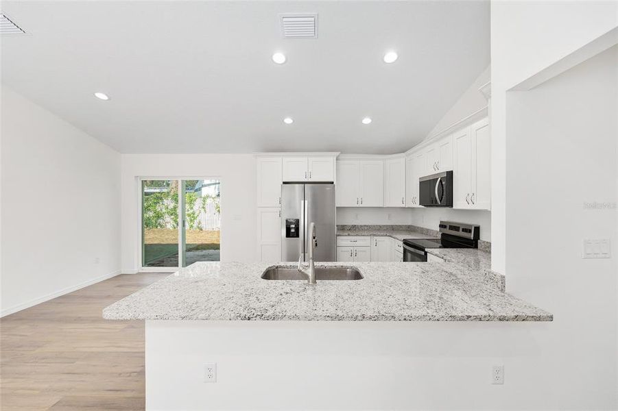 Furnished interior view inside a new home in , Ocala (Image 12).