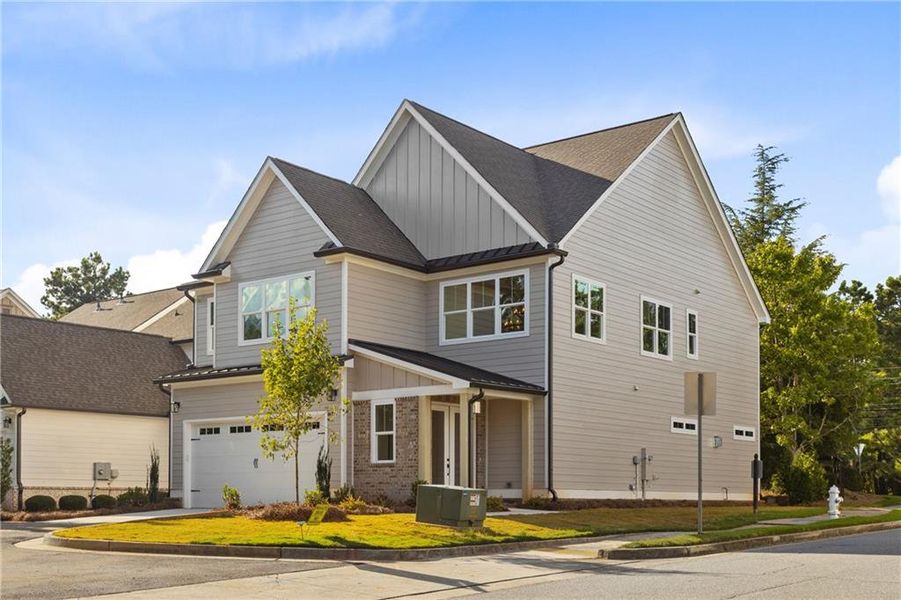 Front exterior of a new home in , Milton, GA, highlighting curb appeal (Image 2).