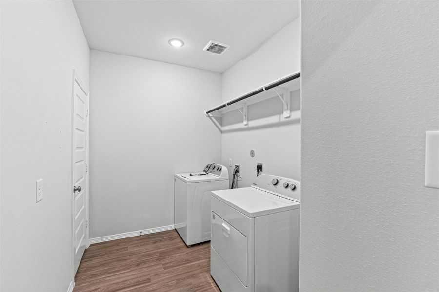 Furnished interior view inside a new home in Liberty Collection at Fairway Farms, Tomball (Image 6).