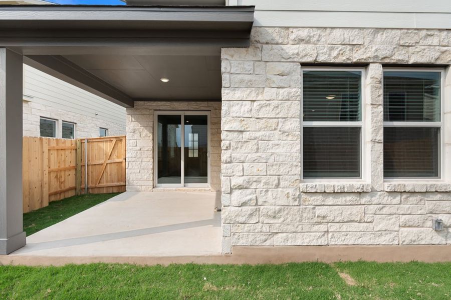 Exterior details and patio area of a home in Union Collection at Park Central, Georgetown (Image 31).