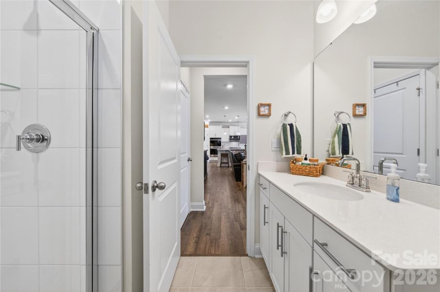 Main level full bath with walk in shower.