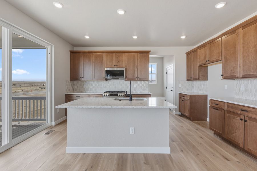 Furnished interior view inside a new home in The Aurora Highlands, Aurora (Image 5).