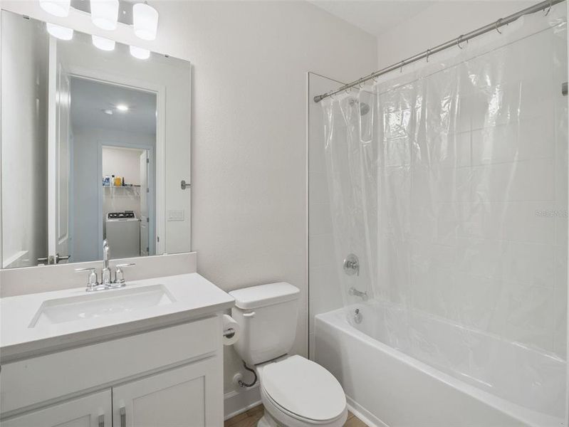 Furnished interior view inside a new home in Harvest at Ovation, Winter Garden (Image 31).