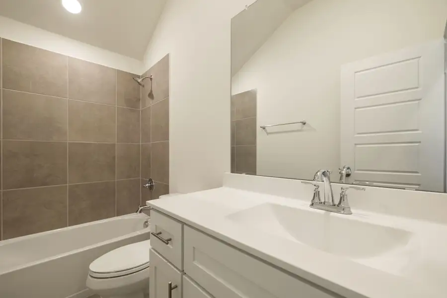 Representative furnished interior of a home built from the Hadley by Graham Hart Home Builder in Bear Ridge, Burleson (Image 4). Representative furnished interior of a home built from the Hadley by Graham Hart Home Builder in Bear Ridge, Burleson (Image 4).