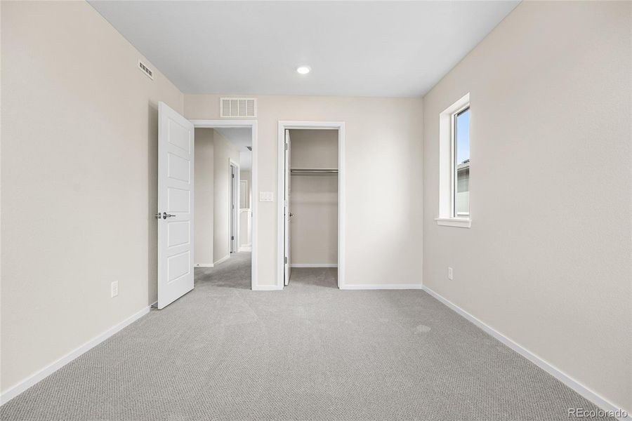 Spacious, unfurnished interior of a new home in Barefoot Village, Firestone (Image 28).