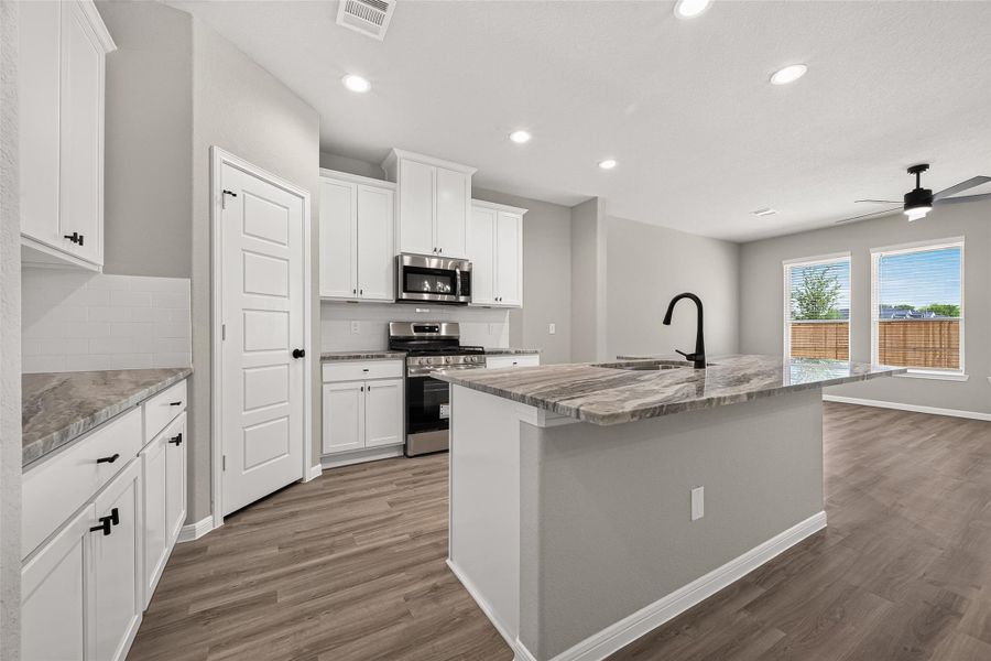 Furnished interior view inside a new home in , Angleton (Image 11).