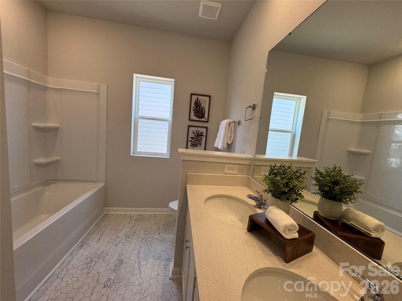 Furnished interior view inside a new home in McFarland Estates, York (Image 15).