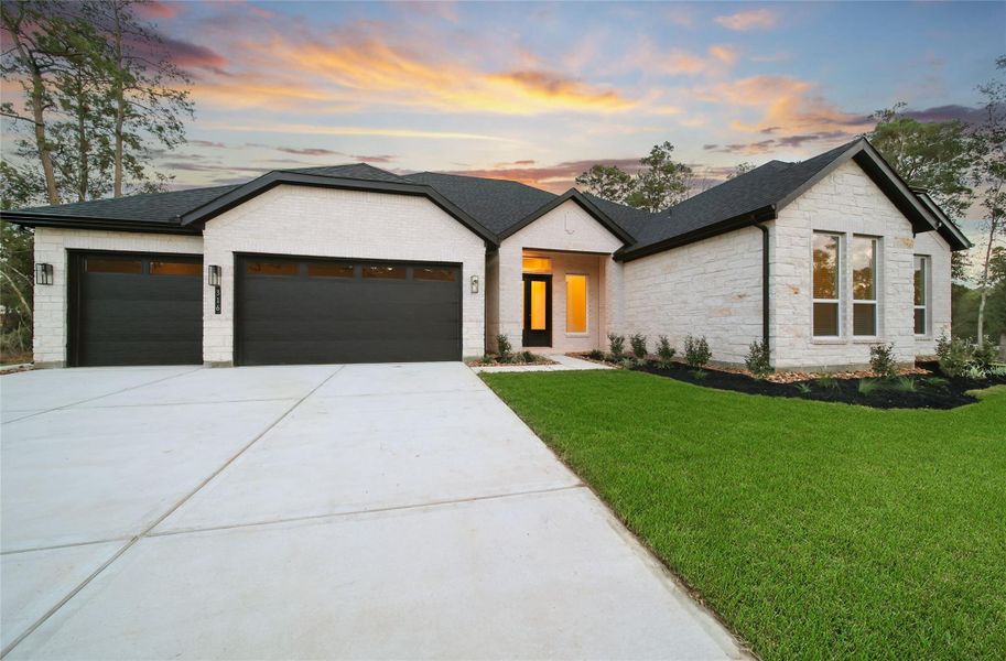Front exterior of a new home in Butlers Bend Estates, Pinehurst, TX, highlighting curb appeal (Image 23).
