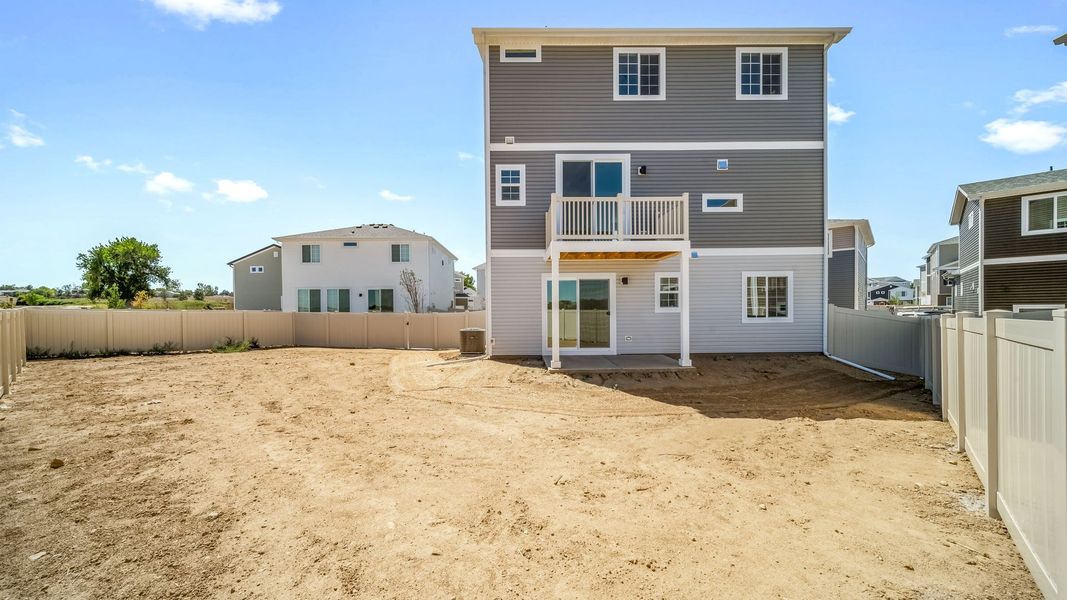 Exterior details and patio area of a home in Thompson River Ranch, Johnstown (Image 23).