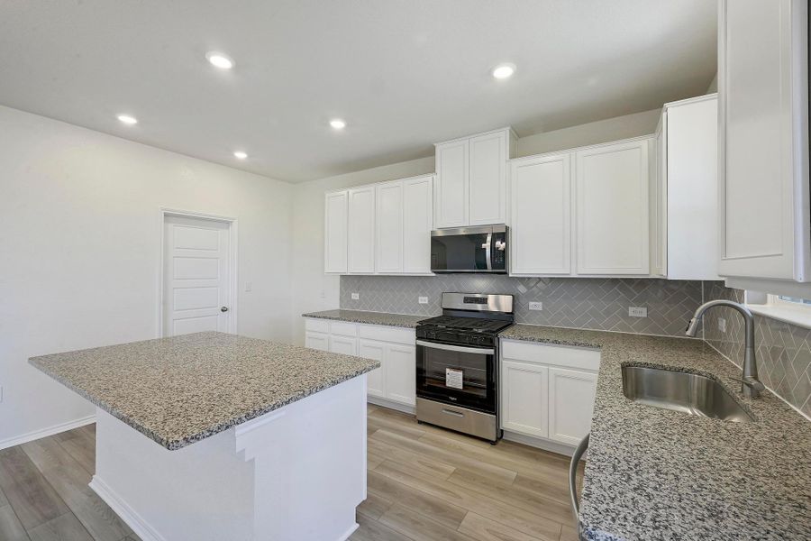 Furnished interior view inside a new home in Centerpoint Meadows, Lockhart (Image 9).
