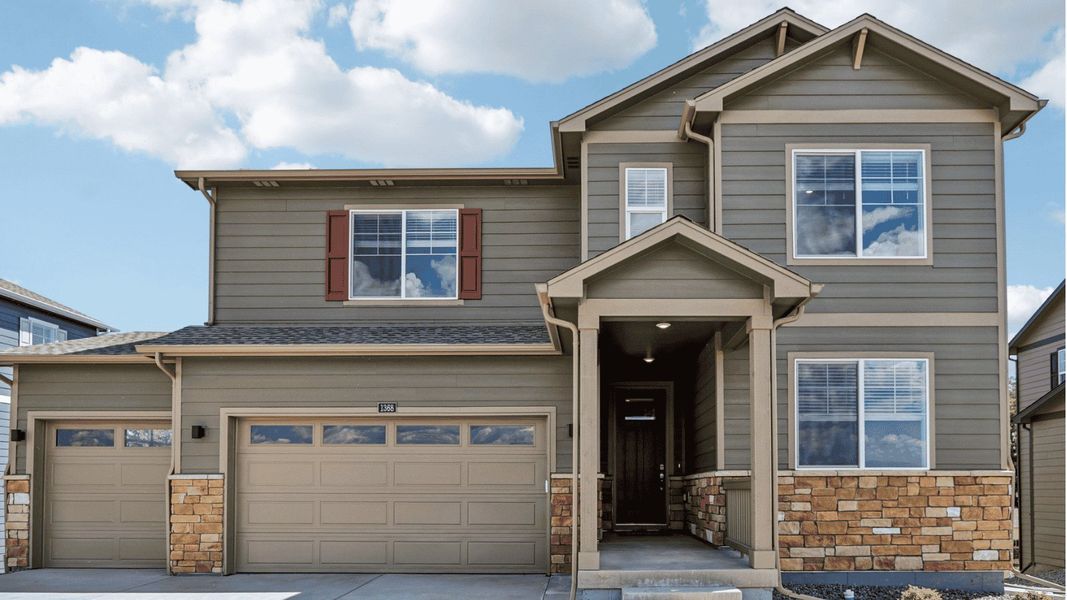 Front exterior of a new home in Vantage, Berthoud, CO, highlighting curb appeal (Image 1). Front exterior of a new home in Vantage, Berthoud, CO, highlighting curb appeal (Image 1).