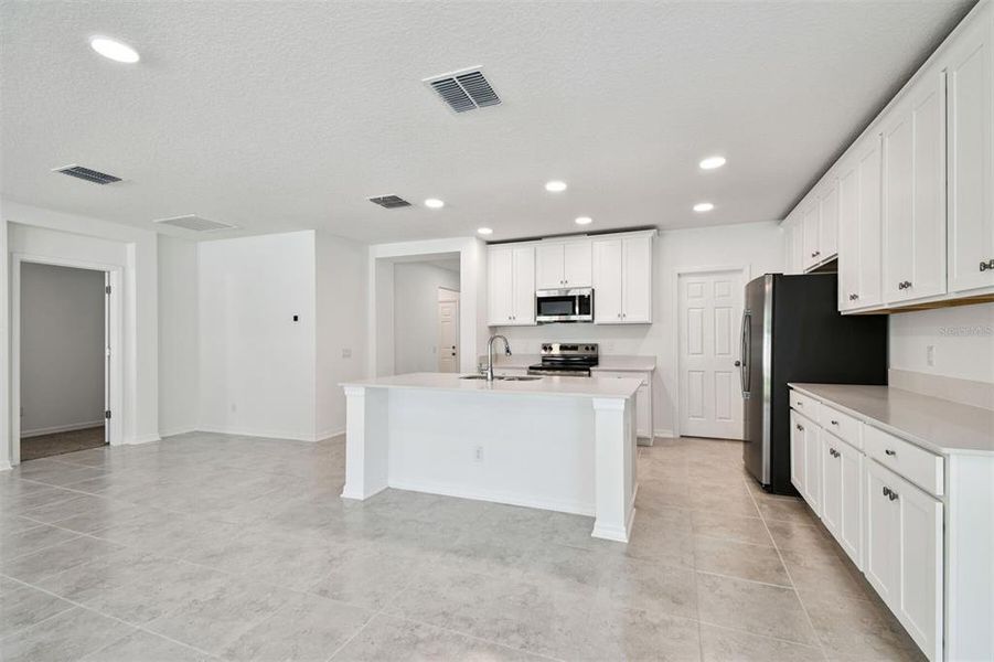 Furnished interior view inside a new home in Meadow Oaks, Hudson (Image 5).