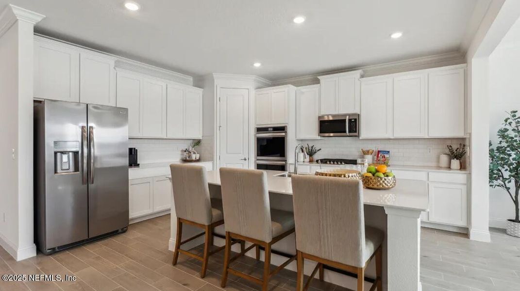Furnished interior view inside a new home in Silver Meadows at SilverLeaf: Silver Meadows 60s, St. Augustine (Image 16).