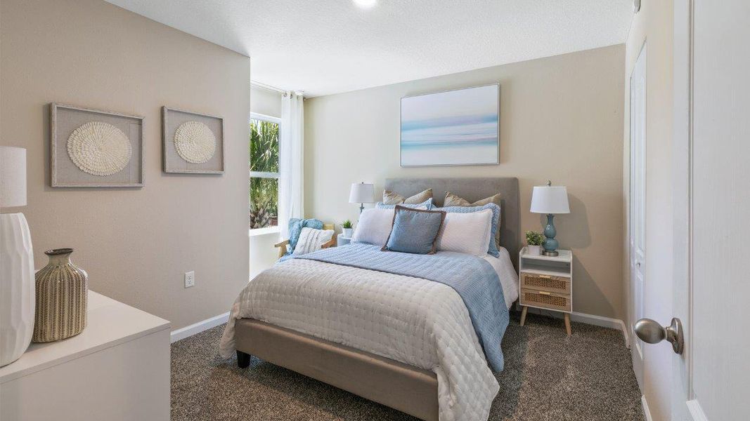 Representative furnished interior of a home built from the GREYSON by D.R. Horton in Hansen Creek, Jacksonville (Image 18).