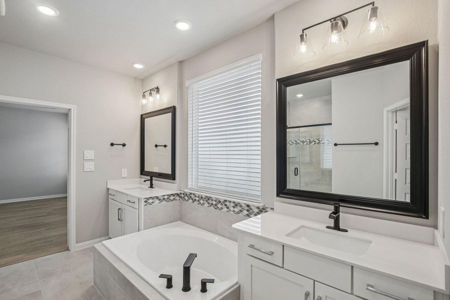 Furnished interior view inside a new home in Spring Brook Village - Luxe Series, Houston (Image 7). Furnished interior view inside a new home in Spring Brook Village - Luxe Series, Houston (Image 7).