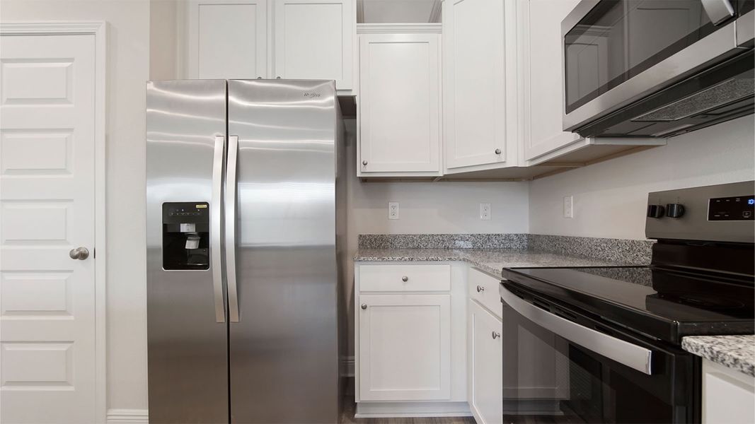 Representative furnished interior of a home built from the Palm Interior by D.R. Horton in Caballeros Estates Townhomes at Hombre, Panama City Beach (Image 11). Representative furnished interior of a home built from the Palm Interior by D.R. Horton in Caballeros Estates Townhomes at Hombre, Panama City Beach (Image 11).