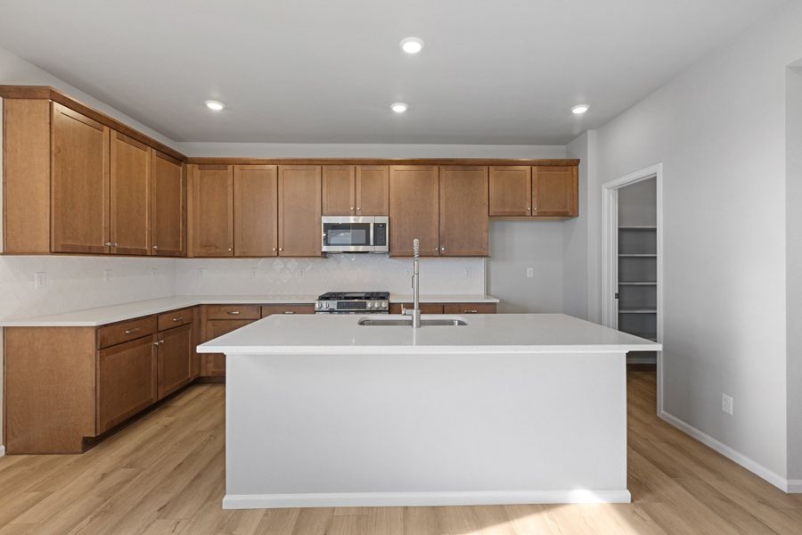 Furnished interior view inside a new home in The Legacy Collection at Talon Pointe, Thornton (Image 4). Furnished interior view inside a new home in The Legacy Collection at Talon Pointe, Thornton (Image 4).