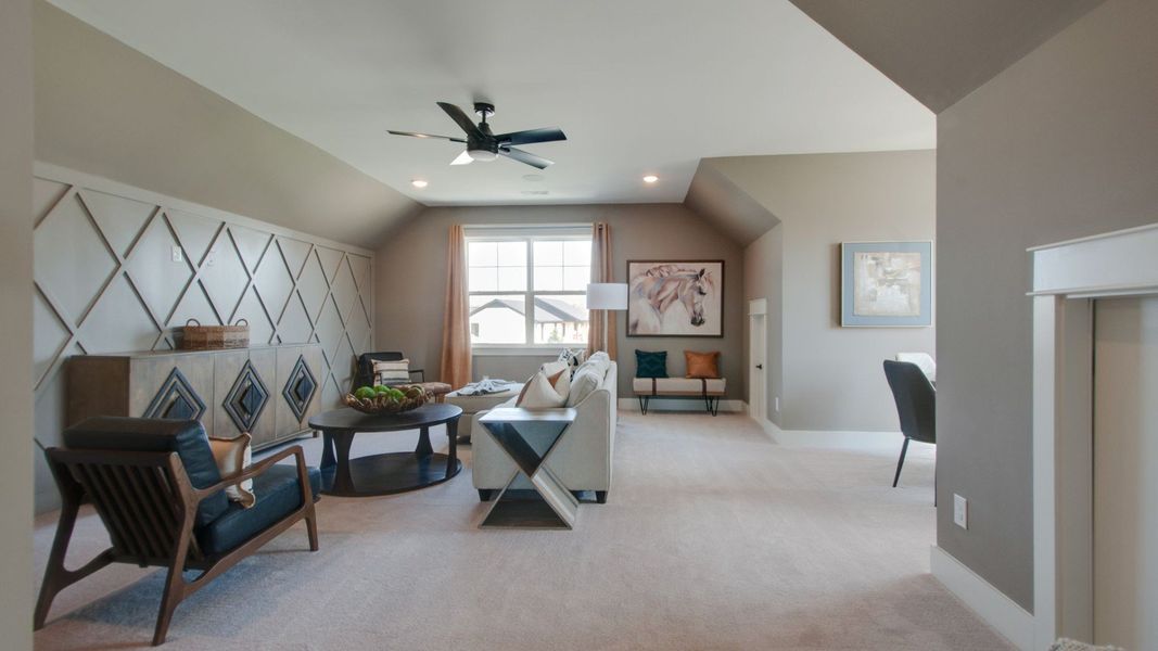 Large upstairs bonus room for movie and game nights Large upstairs bonus room for movie and game nights