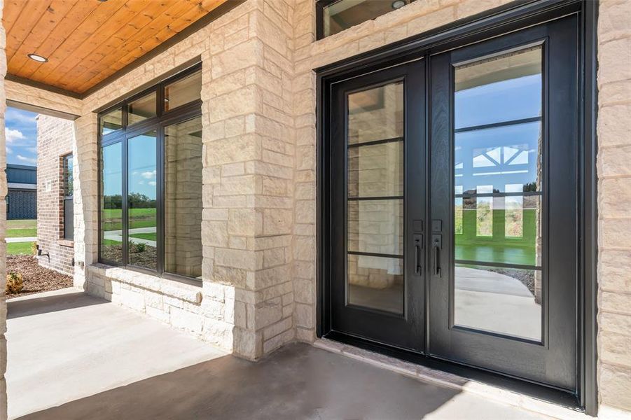 Exterior details and patio area of a home in Eagles Bluff, Hudson Oaks (Image 29).