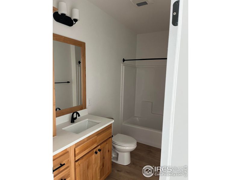 Furnished interior view inside a new home in , Ault (Image 13).