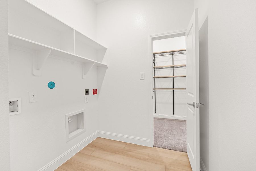 Laundry room connects to primary closet Laundry room connects to primary closet