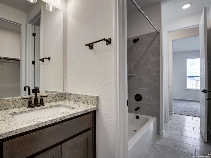 Furnished interior view inside a new home in The Reserve at Potranco Oaks, Castroville (Image 19).
