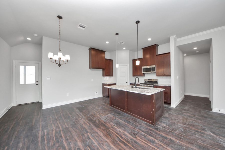 Furnished interior view inside a new home in Hill & Dale Ranch, Splendora (Image 13).