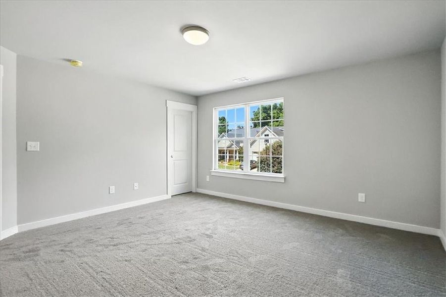 Spacious, unfurnished interior of a new home in Traditions of Braselton, Jefferson (Image 24).