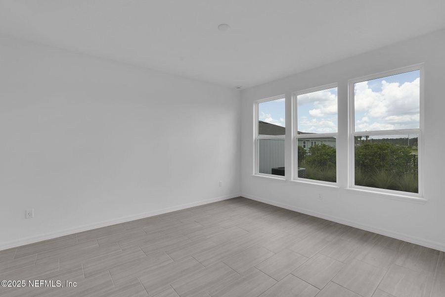 Spacious, unfurnished interior of a new home in Del Webb Wildlight, Yulee (Image 30).